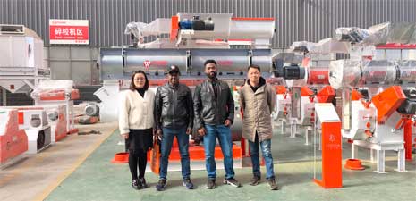 加納客戶訪問強(qiáng)福機(jī)械購買飼料顆粒設(shè)備